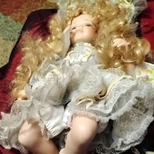 Elegant Porcelain Doll with Golden Hair